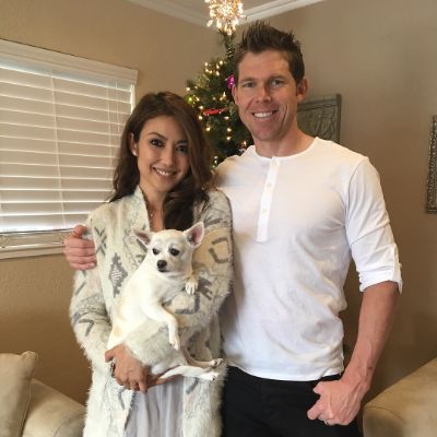 Photo of Chasty Ballesteros and her husband, Curtis Keene along with their cute pet dog. 